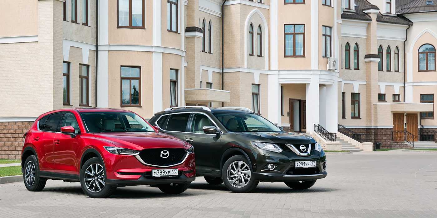 Mazda cx-5 vs audi q3: практичность против гламура